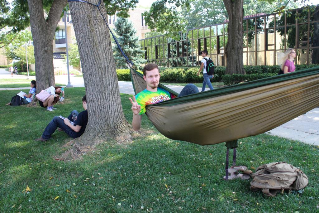 Not something you see everyday--student opts for a hammock hung on trees in front of MC's student service building for a relaxing nap. (photo: Enori Atsu)