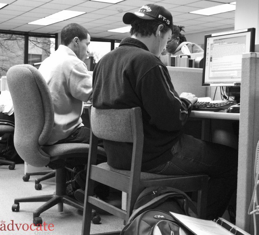 Students in the Macklin Tower work on the library computers. -- Photo by: Allie Heidel