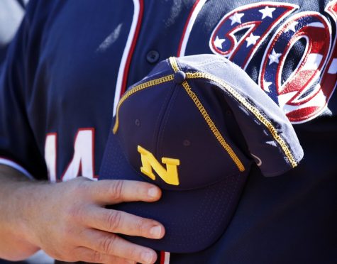The Washington Nationals wore Navy hats before both games on Tuesday
