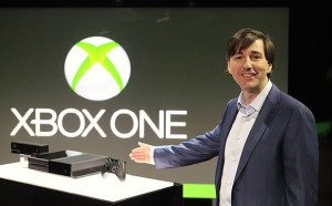 Microsoft's President of Entertainment Business at Microsoft shows off the new XBOX ONE model