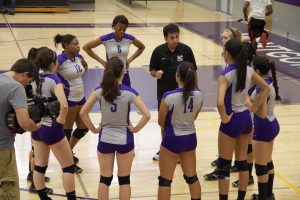 MC's women volleyball head coach, Amir Mafinejad, gives instructions during a timeout. (Photo Credit: Adriano Cassoma)