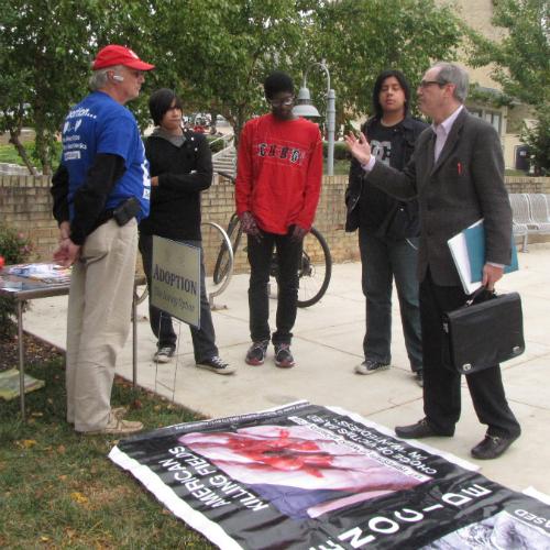 A gathering of students discuss and debate the topic of abortion with Garrison frequently throughout each day.