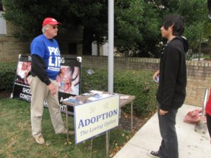 Activist Kenn Garrison argues against abortion while using Montgomery College to convey his message