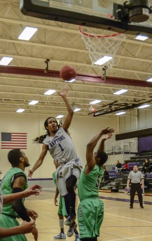 D'Angelo Vaughn hits a floater in the lane for two.