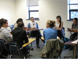 The Women’s Studies Club gather in HU 122 to discuss key points to the beginning of their petition In photo: Emily Christian, Becky Rosansky, Sara Black, Audrey Nankobago, Rima Sakhawala (Vice-President), Alexandra Weidt (President), Tatiana Mendez, Wanda Salcedo (Treasurer) (Photo credit: Ejig Diriba)