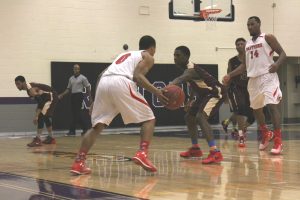 (Photo Credit: Atsuaki Enori) Panthers' sophomore guard, Brian Kelley, sets the pick-and-roll