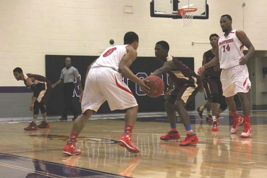 (Photo Credit: Atsuaki Enori) Panthers sophomore guard, Brian Kelley, sets the pick-and-roll