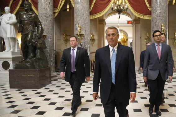 House Speaker John Boehner (R-OH) (2nd R) returns to his office after a visit to the House floor for procedural votes for legislation to fund the Department of Homeland Security at the Capitol in Washington, February 27, 2015.
Credit: Reuters/Jonathan Ernst