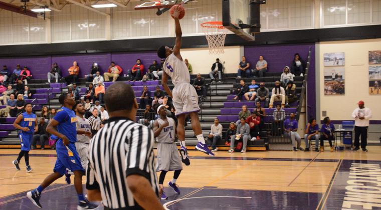 Emmanuel Ijeh dunking at the tip-off tournament 
Credit: Mc Athletics Photography