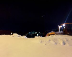 MC snow clean-up crew seen Monday night cleaning parking lots