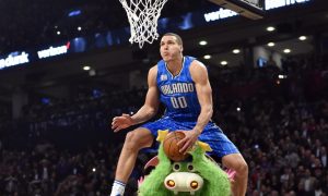 Feb 13, 2016; Toronto, Ontario, Canada; Orlando Magic forward Aaron Gordon dunks over the Magic mascot during the dunk contest during the NBA All Star Saturday Night at Air Canada Centre. Mandatory Credit: Bob Donnan-USA TODAY Sports