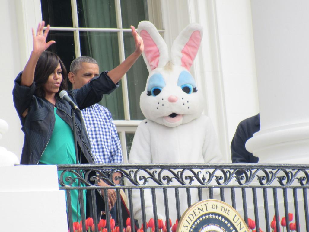 Michelle Obama addressing the audience, saying "Let's Celebrate"