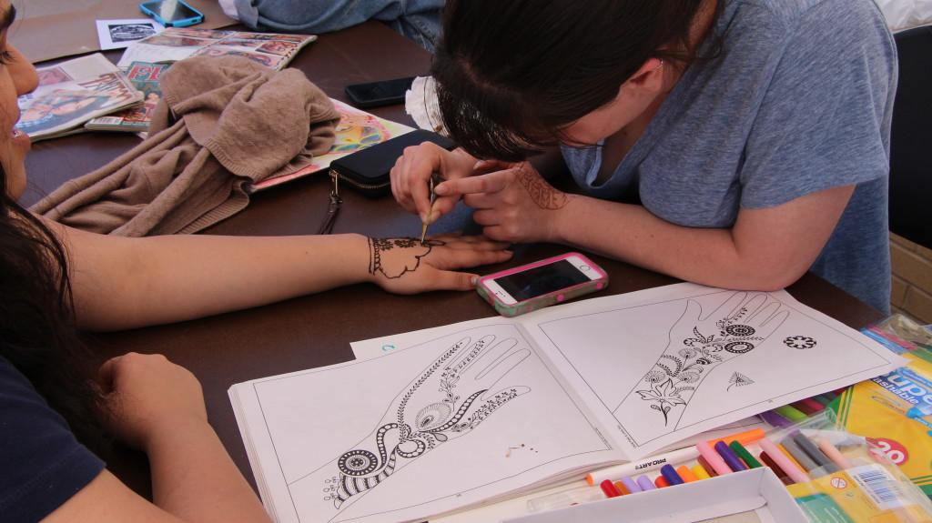 Henna being done on a student at the artw@lk (photo: Nikole Coates)