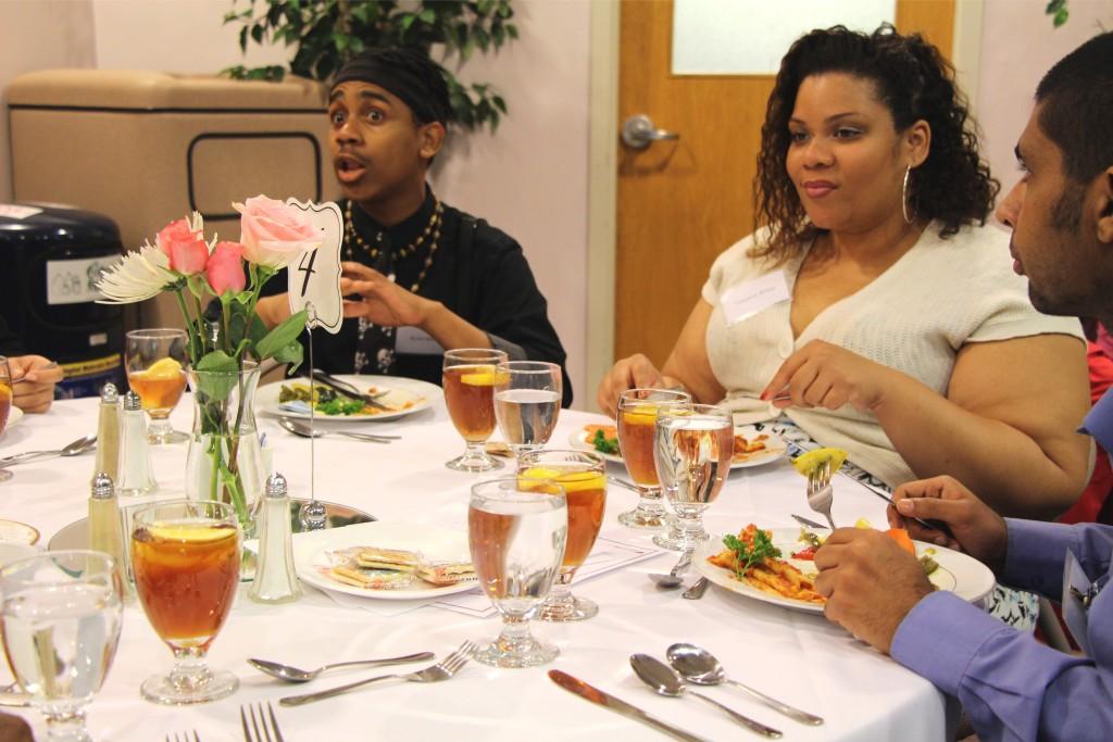 Students having lively conversations at the etiquette dinner. (photo: Sara Monterroso)