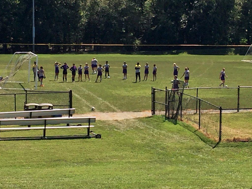 Women's soccer team at practice, ready to dominate the next game (photo: Grant Gibson)