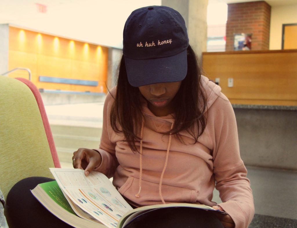 Breanna English studying from her textbook for a future Biology exam (photo: Sara Monterroso)