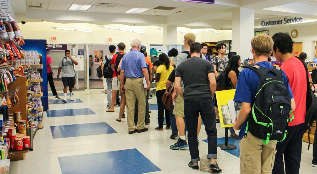 Students buying school supplies at MC's supply store, now owned by Follet. (photo: Enori Atsu)