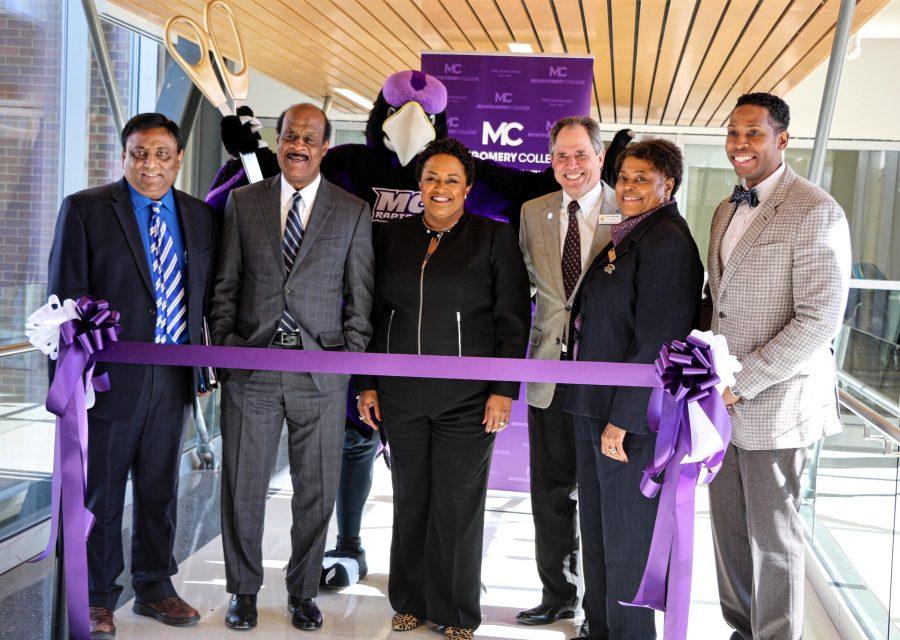 Ribbon cutting ceremony of the opening of Science Center West on the second floor pedestrian bridge. 
From left to right: Dr. Sanjay K. Rai, Senior VP for Academic affairs at MC, The Honorable Ike Leggett, Montgomery County Executive, Dr. DeRionne P. Pollard, President of MC, The Honorable Roger Berliner, Montgomery County Council President.