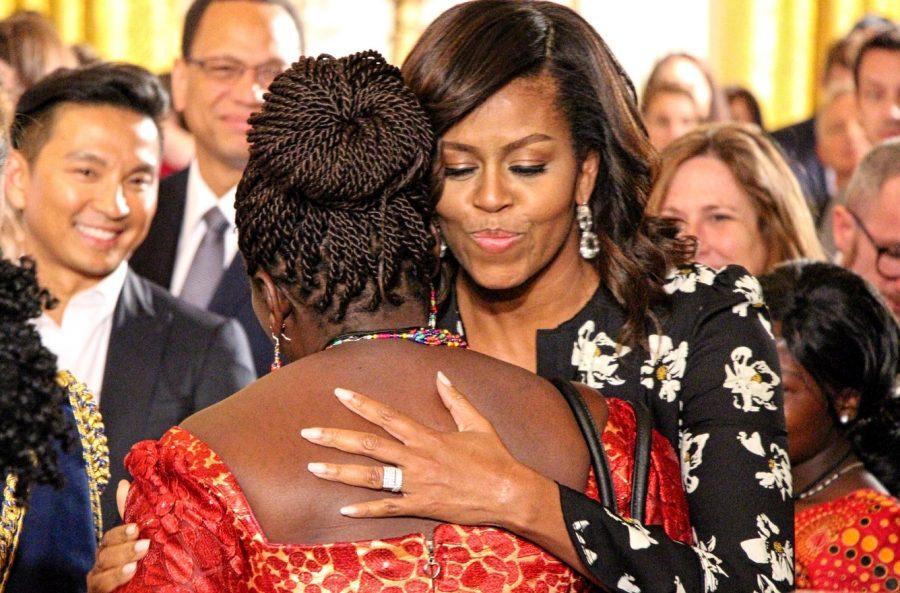 Pictured above is the First Lady embracing one of the many young girls who attended the premiere. She made sure every single one of them got a hug from her that day. (photo: Sara Monterroso)