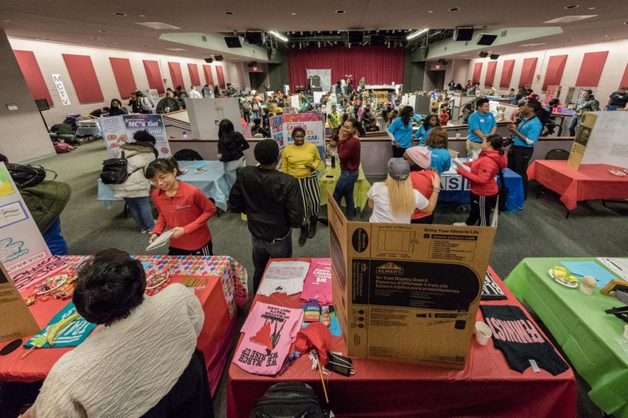 Students and clubs tables at Club Rush in the Theatre Arts Arena. 