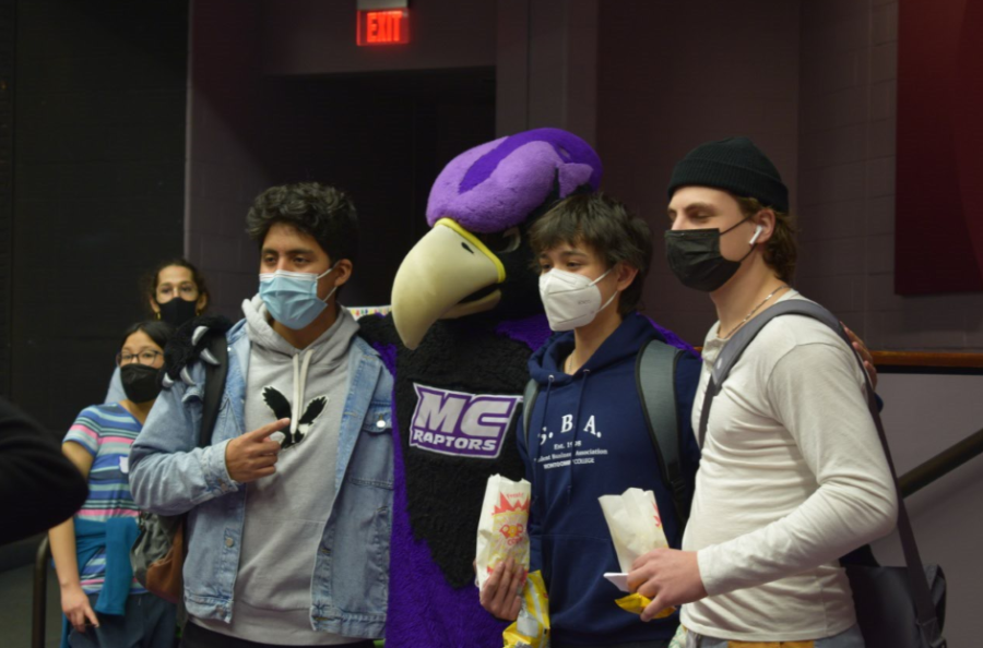 Students gather around Montgomery Colleges own, Monty C. Raptor, for the Spring 2022 Club Rush. 