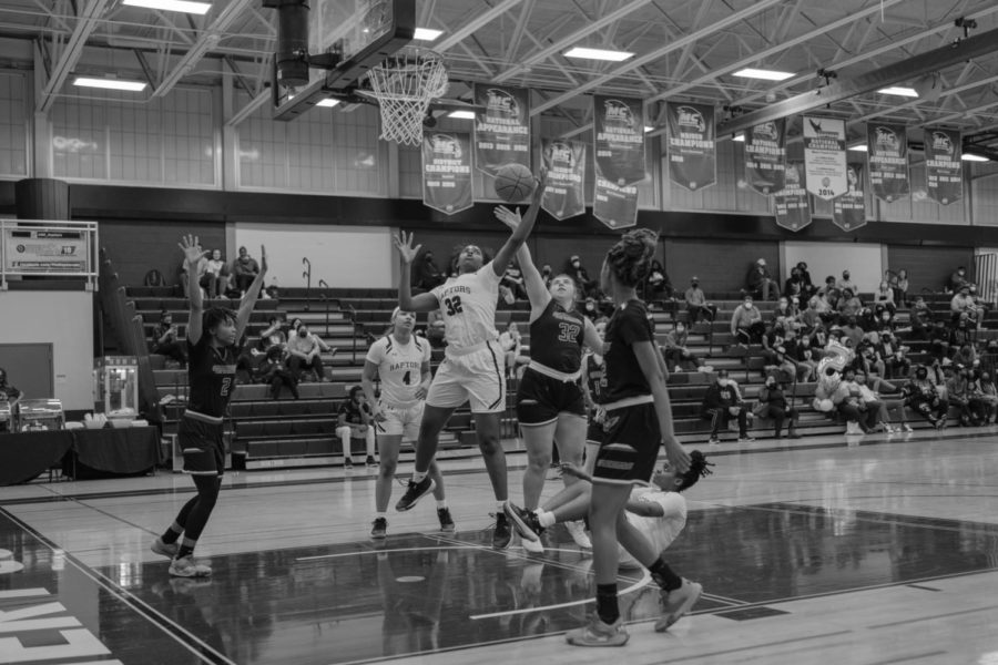 Sophomore Forward Kayla Moore grabs a rebound in the Raptors 99-37 win against CCBC Catonsville on February 23, 2022. Photo by Michael Hyman.