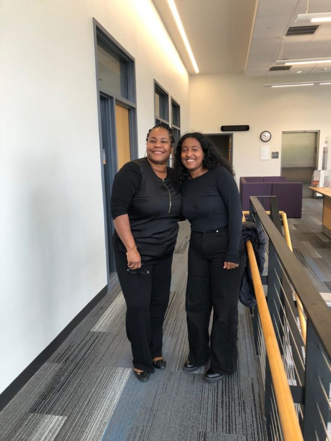 Ms. Lisa Hackley and Fikir rocking black outfits on Twin Tuesday.