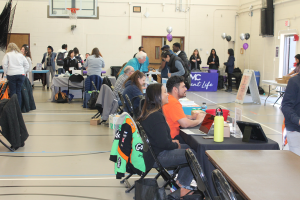 Students signing up for community service opportunities 