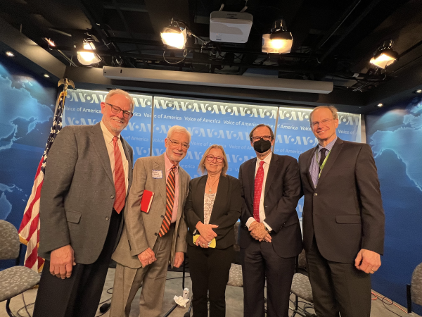 The panelists posed for this photo after the discussion. From left to right: Steve Geimann (moderator), Sanford J. Ungar, Amanda Bennett, David Ensor, and John Lippman.