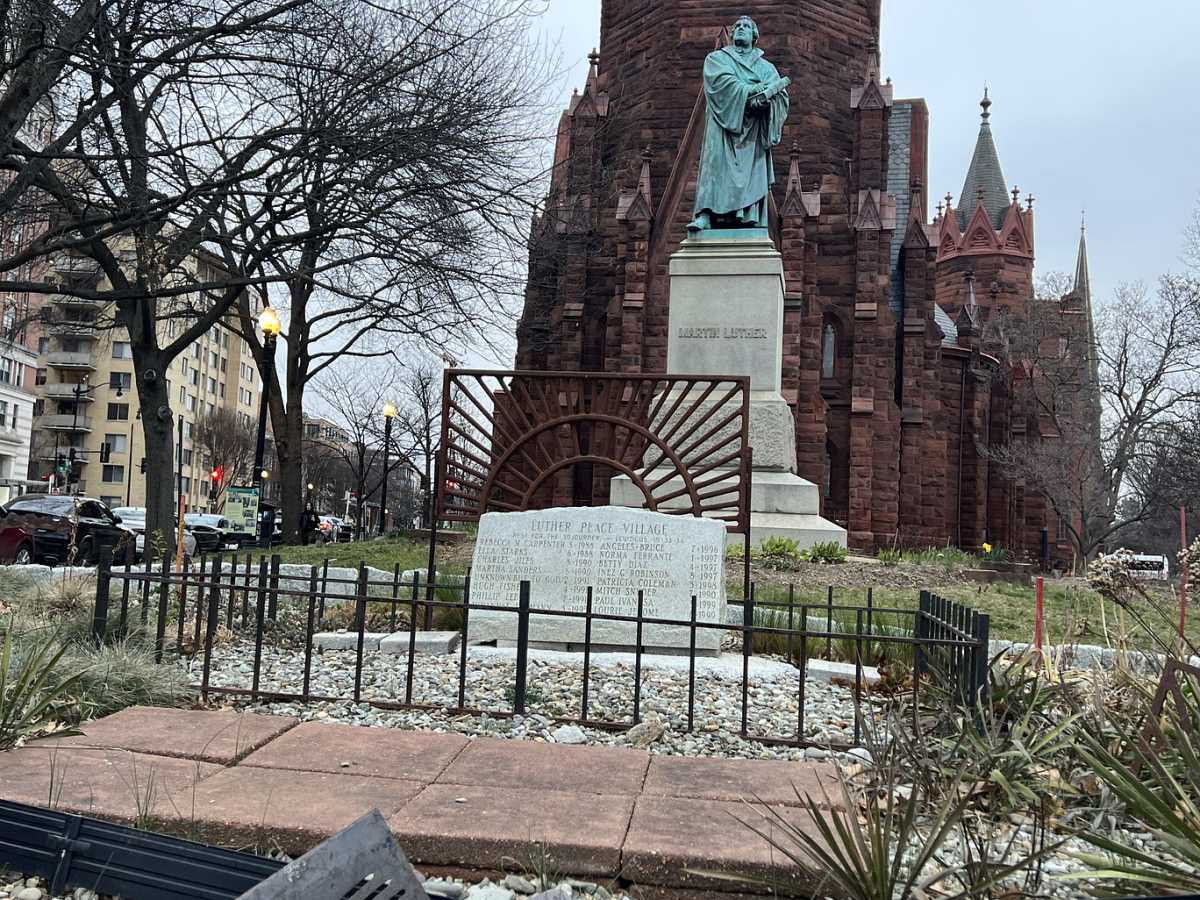 A+statue+of+The+Reverend+Martin+Luther+stands+an+iconic+symbol+of+the+historical+Luther+Place+Memorial+Church+in+Washington+D.C.