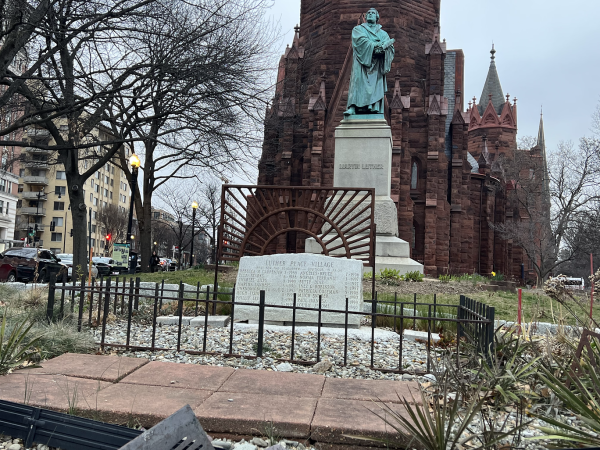A statue of The Reverend Martin Luther stands an iconic symbol of the historical Luther Place Memorial Church in Washington D.C.