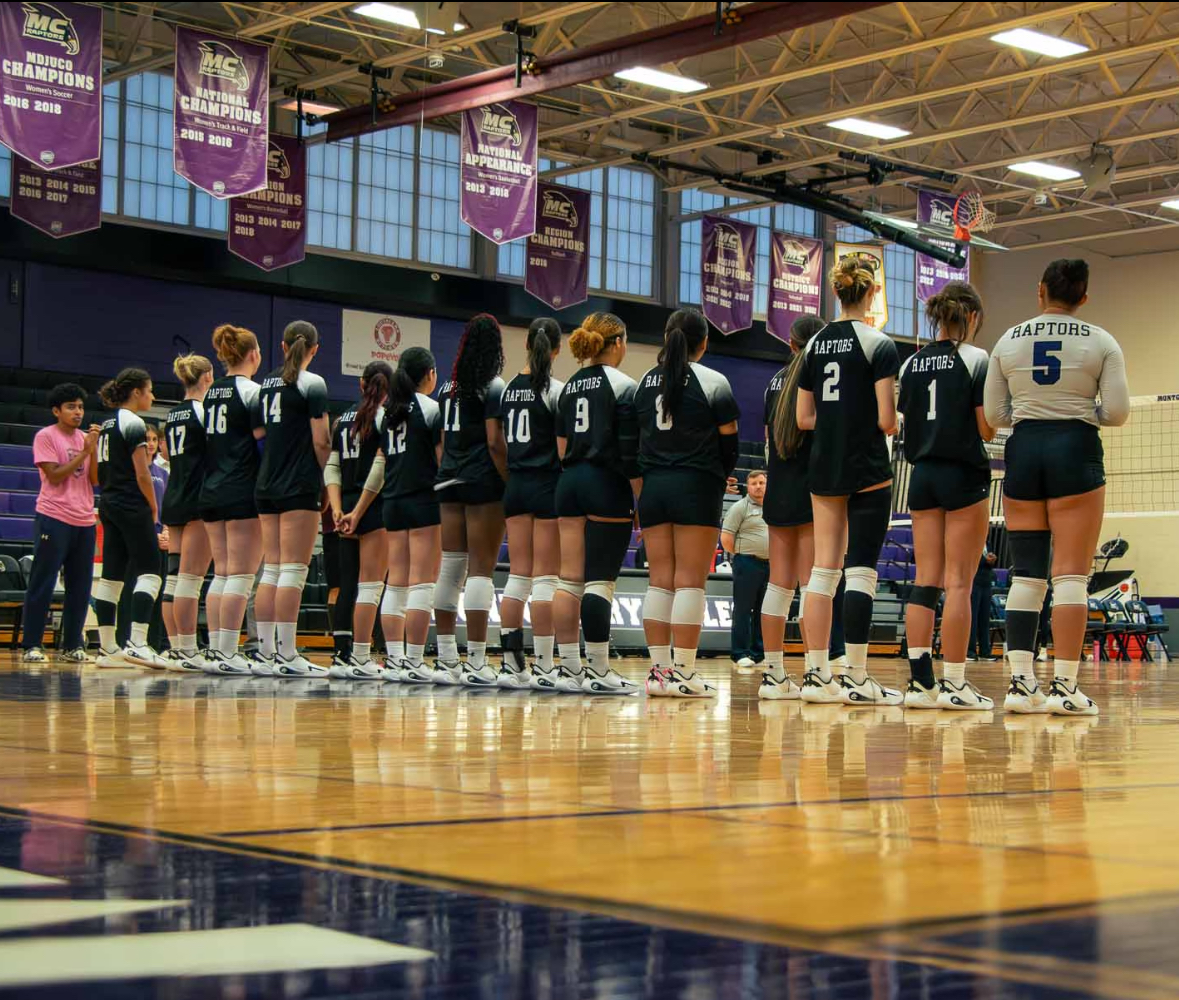 The Raptors stand for the national anthem prior to their match against Anne Arundel Community College. Photo taken by