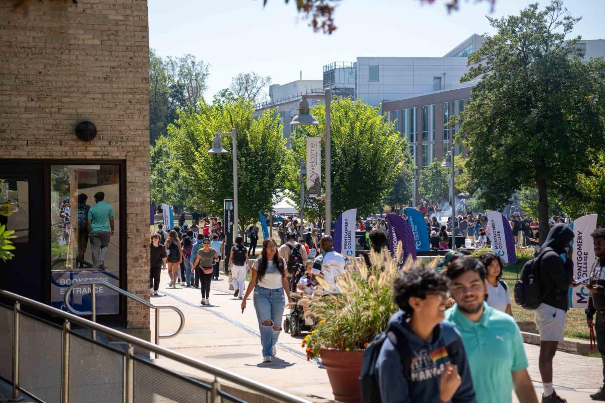 Photo of students walking around campus. (Photo credit: Yabez Jackson)