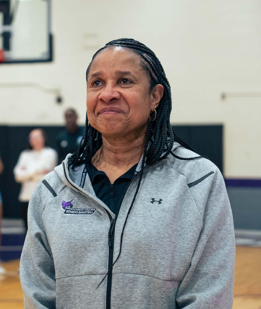 Tarlouh “Coach G” Gasque is congratulated by current and former players and colleagues for surpassing 300 wins with Montgomery College. Photo taken by Yabez Jackson